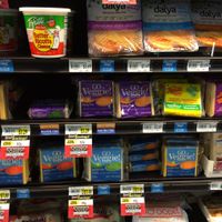 Different cheeses in grocery store at Mustard Seed Market - Montrose in Akron