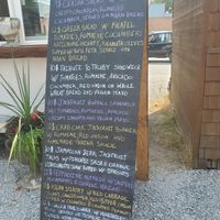 Menu outside the cart with day's offerings at Dirty Vegan in Sandpoint