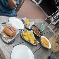 Not chicken burger, garlic bread, poutine, and hotdog   at The Locker Room in Queenstown