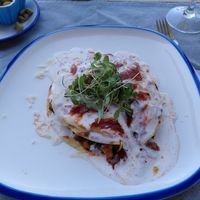 Vegan enchiladas with optional spicy sauce at La Hormiga in Pontevedra