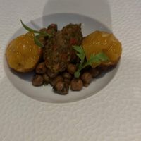 Garbanzo beans with akra topped with a chutney   at Grey Sweater in Oklahoma City