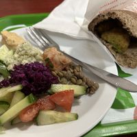 You make a plate with whatever you want from the salad bar, and get your hot falafels, all for 8€  at Mr Falafel - Lemonnier in Brussels