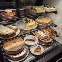 Vegan are: top right cake with blueberry, down left cake with sparkling gold chocolate at Coffeedesk Kawiarnia in Warsaw