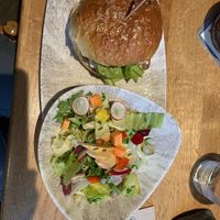 Green mountain burger with side saladd  at Boutique Hotel The River House in Andermatt