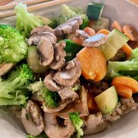 My brown rice bowl with steamed veggies.   at 620 State in Bristol
