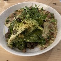 Leek and mushroom ragu on herby polenta   at The Blonde Beet in Stamford