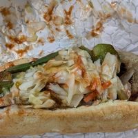 Hotdog with peppers and onions at Plant Based Heat in Memphis