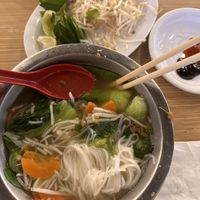 Rice noodle soup w side veggies   at Quang Restaurant in Minneapolis