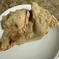 Roti (got banged up in the bag in the car is all)   at Great Indian Kitchen in Albany