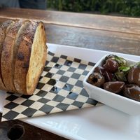 Warmed olives and really good bread at Hey Neighbor in Eugene
