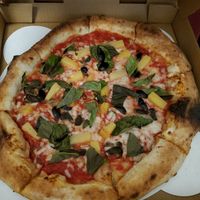 Pineapple, olives and basil with vegan cheese. at Hey Neighbor in Eugene
