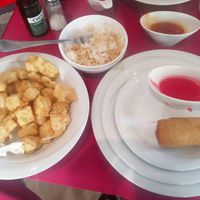 Deep fried tofu on some cabbage, steamed rice, eggrolls at Yan Yan in Haifa
