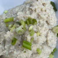 Grits.  at Mo' Brunch + Brews in Houston