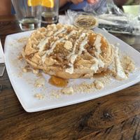 Peach cobbler waffle   at Mo' Brunch + Brews in Houston