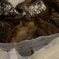 Closeup of croissant pudding   at Mo' Brunch + Brews in Houston