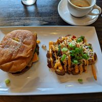 A donut egg sausage sandwich - the Dilla. at Mo' Brunch + Brews in Houston