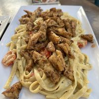 Blackened chikn alfredo pasta  at Mo' Brunch + Brews in Houston