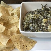 Spinach artichoke dip : super cheezy great!!  at Mo' Brunch + Brews in Houston