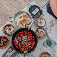 Startersstarters (vegan: salad, bread, eggplant salad, chickpeas with tahini, couscous; vegetarian: feta, tzatziki, greek yogurt dip) at Agora Tavern in Paphos