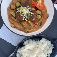 Curry with Cauliflower-rice and vegan tikka masala ‚meatballs'  at Schlosskeller in Bad Hindelang