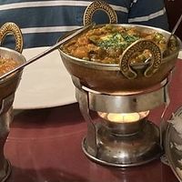 Fresh samosas, dal tarka, bhaigan bhartha, rice, Nan at India Palace in Cookeville