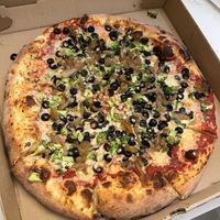 Broccoli, caramelized onions, olive  at Moto Pizza in Falmouth