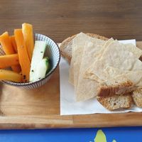 Cucumber and carrot sticks, with bread at Brac Libreria di Arte Contemporanea in Florence