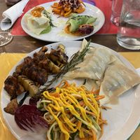  Front: Cruda salad, agnolotti, and seitan masala - would recommend all 3. Back: avocado tartar (just okay), tortellini (recommend), patata (just okay)   at Brac Libreria di Arte Contemporanea in Florence