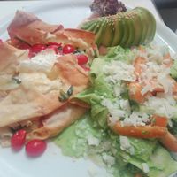 Vegetarian menu meal with choice of salad, pasta/rice and savoury puff pastry at Brac Libreria di Arte Contemporanea in Florence