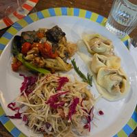 Cabbage and apple salad, Plums Agnolotti, and Legume tempeh at Brac Libreria di Arte Contemporanea in Florence