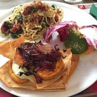 avocado carpaccio, fresh-made spaghetti, and a millefeuille with sweet potato, caramelized onions, and a Tuscan flatbread. at Brac Libreria di Arte Contemporanea in Florence