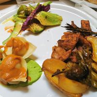 Vegan combo dish (seitan, avocado, ravioli) at Brac Libreria di Arte Contemporanea in Florence