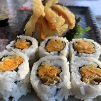 Sweat potato roll and the hand roll behind it  at Wasabi in Saratoga Springs