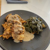 Biscuits and gravy w/ side of greens   at Liora in Baltimore