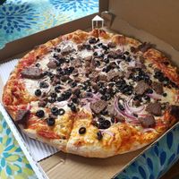Vegan sausage, mushrooms, onion and black olives pizza at Verrazzano Pizza in Half Moon Bay