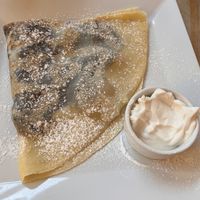 Sweet vegan crepe with chocolate and peach + coconut “sour cream"  at Naleśnikarnia Gramofon in Poznan
