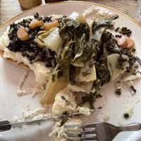 Sourdough toast, cauliflower purée, beluga lentils, chard, pickled plums  at 21 gramm in Berlin