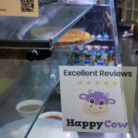 Happy Cow sticker on the display at Santo Seitan in Sao Miguel