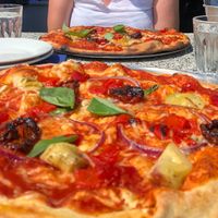 Near the Giar-Dino with vegan mozzarella and far, the standard veggie version. at Bufala in Fowey