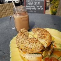 Just egg bagel sandwiche & Chai latte beautifully plated at dirt in Quakertown