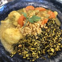Brown rice with cauliflower curry, carrots & heura  at La Mujer de Verde in Mallorca