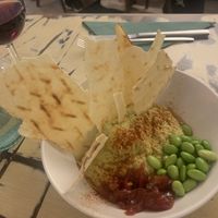 Paté de edamame, tataki de tomate, pan carasau.   at La Mujer de Verde in Mallorca
