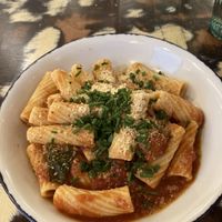 Rigatoni in tomato sauce and vegan Parmesan  at La Mujer de Verde in Mallorca