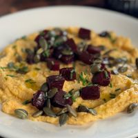 White bean and pumpkin pate with roasted beetroot cubes and walnut bread (Option gluten-free, nut-free)  at La Mujer de Verde in Mallorca