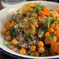 Tricolor quinoa with lemon vegetable tagine, harissa sauce, and crispy chickpeas.  at La Mujer de Verde in Mallorca