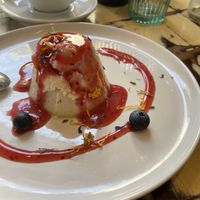 Coconut Panna Cotta wirh raspberry sauce  at La Mujer de Verde in Mallorca