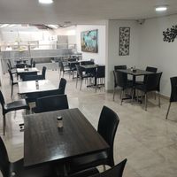 Main dining room, also has another dining room upstairs at Soy Vida - Pasadena in Bogota