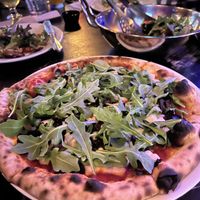 Root salad, pizza with vegan cheese, arugula, and olives   at A.W. Wander in Manlius