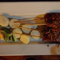 Peanut BBQ-y Tempeh Satay is to die for. Sweet, smoky, sticky and peanutty at Bandung Indonesian Restaurant in Madison