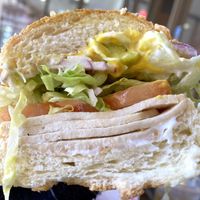 Light Warrior-Turkey free slices, honey mustard, onions, tomato slices, lettuce, pepperoncini, Mayo at Subvegan Sandwiches in Garden Grove